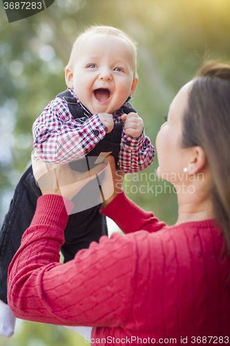 Image of Little Baby Boy Having Fun With Mommy Outdoors
