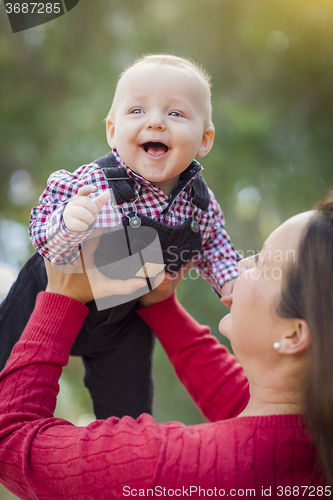 Image of Little Baby Boy Having Fun With Mommy Outdoors