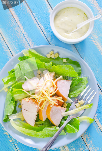 Image of fresh salad with chicken and cheese