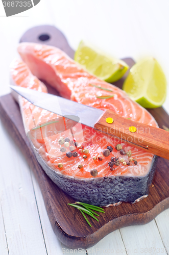 Image of raw salmon steak