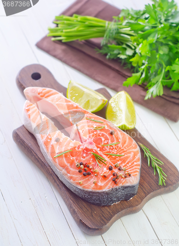 Image of raw salmon steak