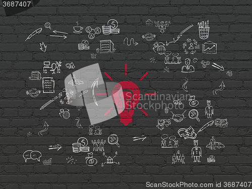 Image of Business concept: Light Bulb on wall background