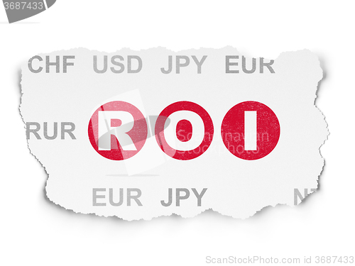 Image of Business concept: ROI on Torn Paper background