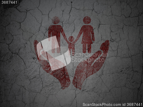 Image of Insurance concept: Family And Palm on grunge wall background