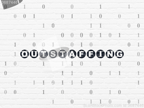 Image of Business concept: Outstaffing on wall background