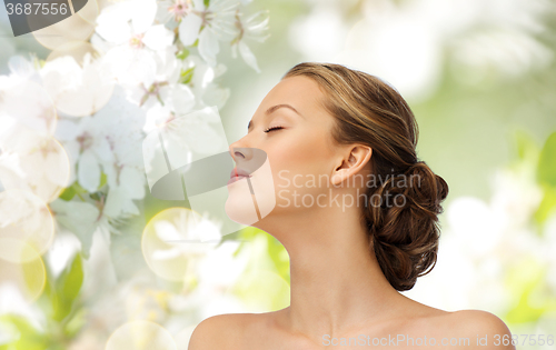 Image of young woman face and shoulders