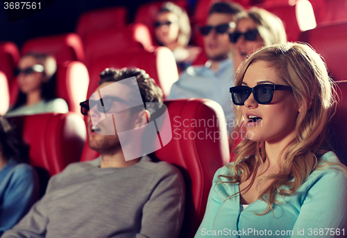 Image of friends watching horror movie in 3d theater