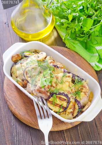 Image of eggplants with meat and cheese