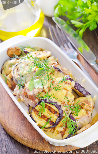 Image of eggplants with meat and cheese