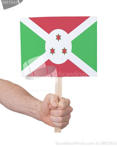 Image of Hand holding small card - Flag of Burundi