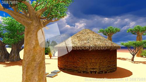 Image of African village with traditional huts 