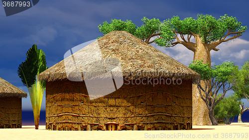 Image of African village with traditional huts 