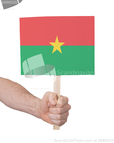 Image of Hand holding small card - Flag of Burkina Faso