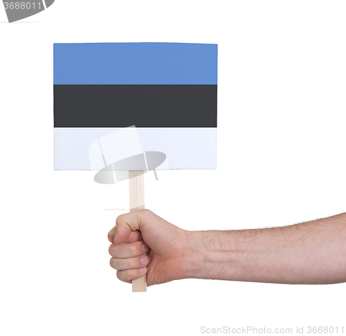 Image of Hand holding small card - Flag of Estonia