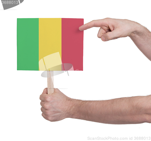 Image of Hand holding small card - Flag of Mali