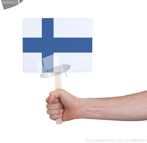 Image of Hand holding small card - Flag of Finland