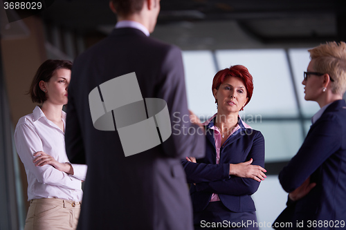 Image of business people group on meeting at modern bright office