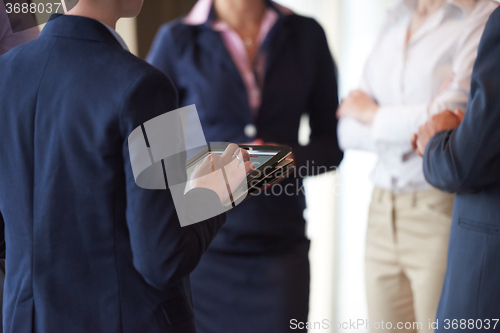 Image of business people group on meeting at modern bright office
