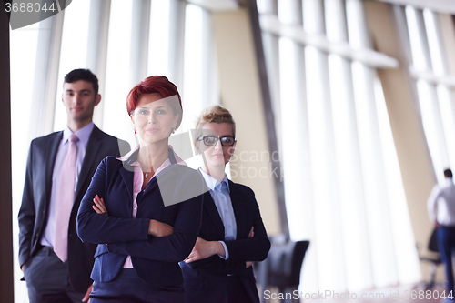 Image of diverse business people group with redhair  woman in front