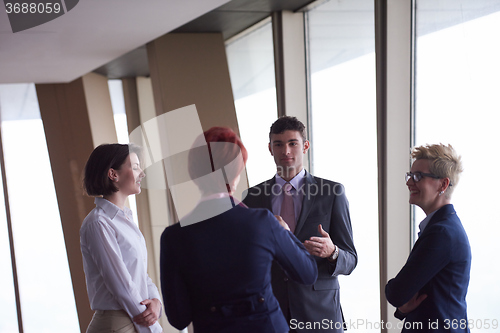Image of business people group on meeting at modern bright office