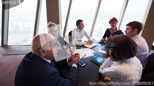 Image of business people group on meeting at modern bright office