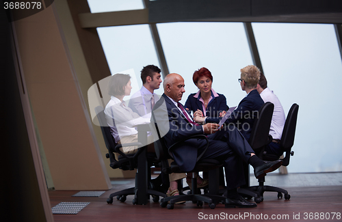 Image of business people group on meeting at modern bright office