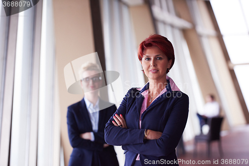 Image of business woman goup at modern bright office