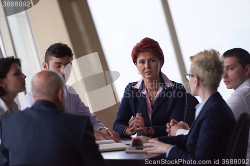 Image of business people group on meeting at modern bright office