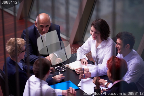 Image of business people group on meeting at modern bright office