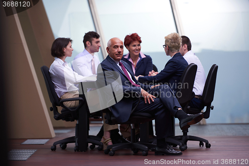 Image of business people group on meeting at modern bright office