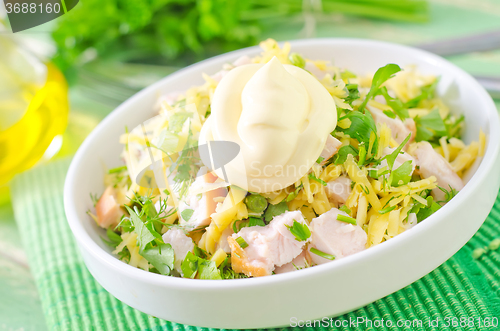 Image of salad with chicken and cheese