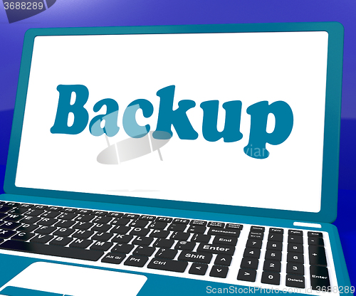 Image of Backup Laptop Shows Archiving Back Up And Storage