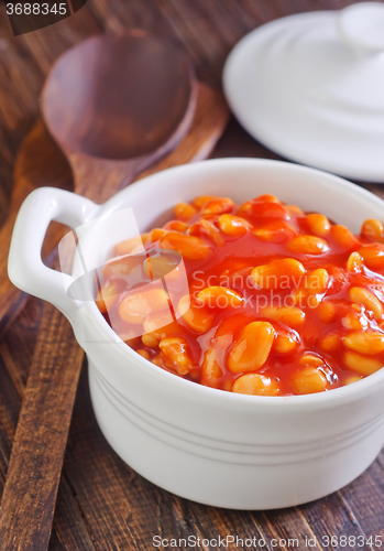 Image of white beans with tomato sauce