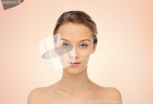 Image of young woman face and shoulders