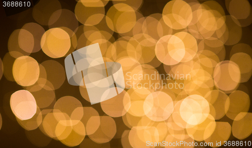 Image of blurred golden lights bokeh
