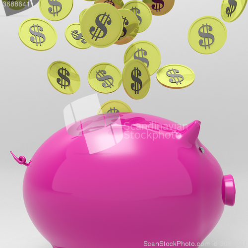 Image of Coins Entering Piggybank Shows Money Saving