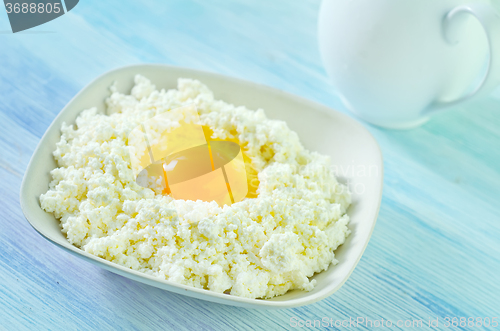 Image of cottage and eggs