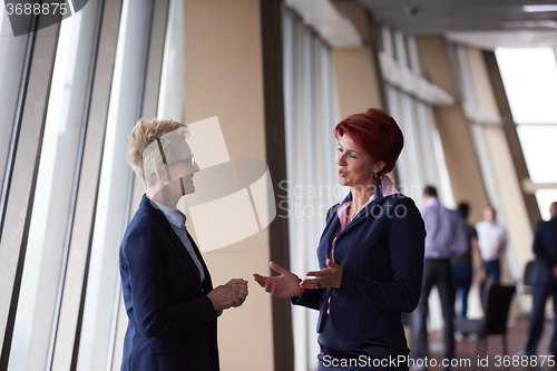 Image of business woman goup at modern bright office
