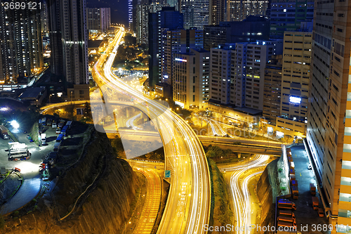 Image of busy traffic night in finance urban