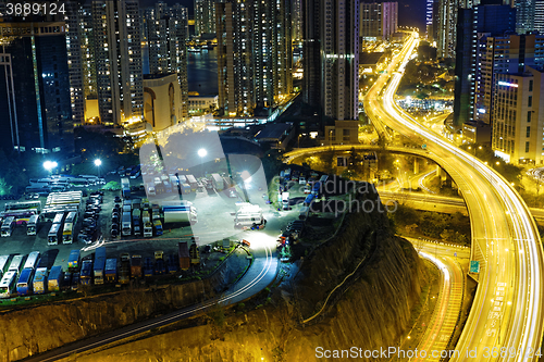 Image of busy traffic night in finance urban