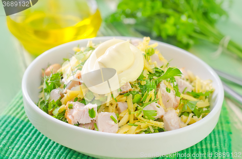 Image of salad with chicken and cheese