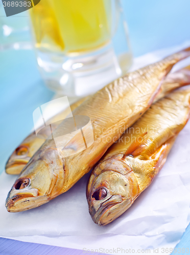 Image of smoked fish with beer