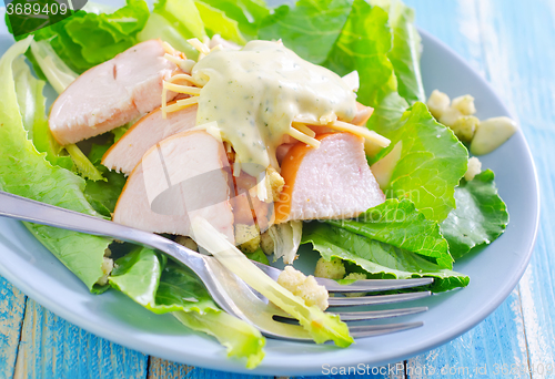 Image of fresh salad with chicken and cheese