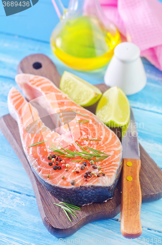 Image of raw salmon steak