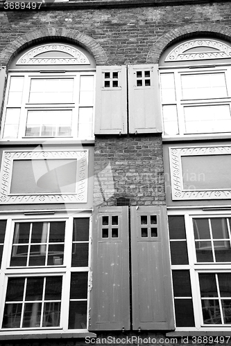 Image of old window in europe london  red brick wall     and      histori
