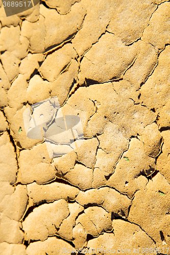 Image of brown dry sand in   abstract