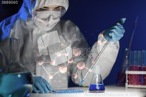 Image of close up of scientist making test in lab