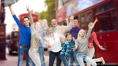 Image of group of happy people having fun over london city