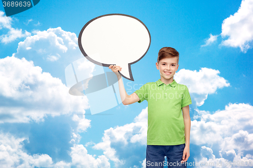 Image of happy boy holding blank white text bubble banner