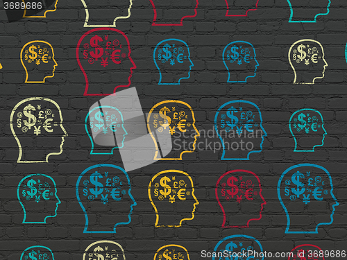 Image of Business concept: Head With Finance Symbol icons on wall background